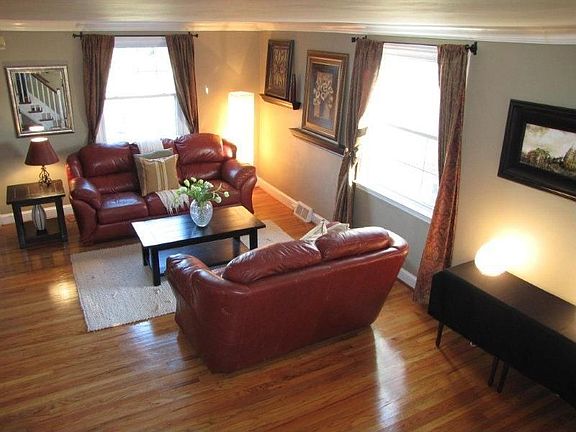 Living room is spacious, bright, and elegant