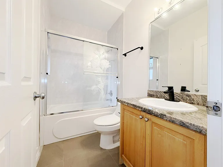 6952 Curtis St — Photo 9