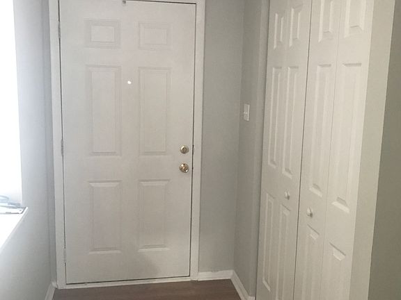 Front entry with hallway closet