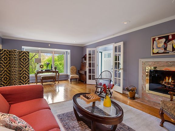 Expansive Living Room/FPL with Sunlit Dining Area