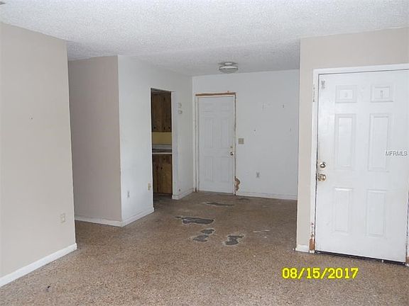View from living room towards dining room and kitchen