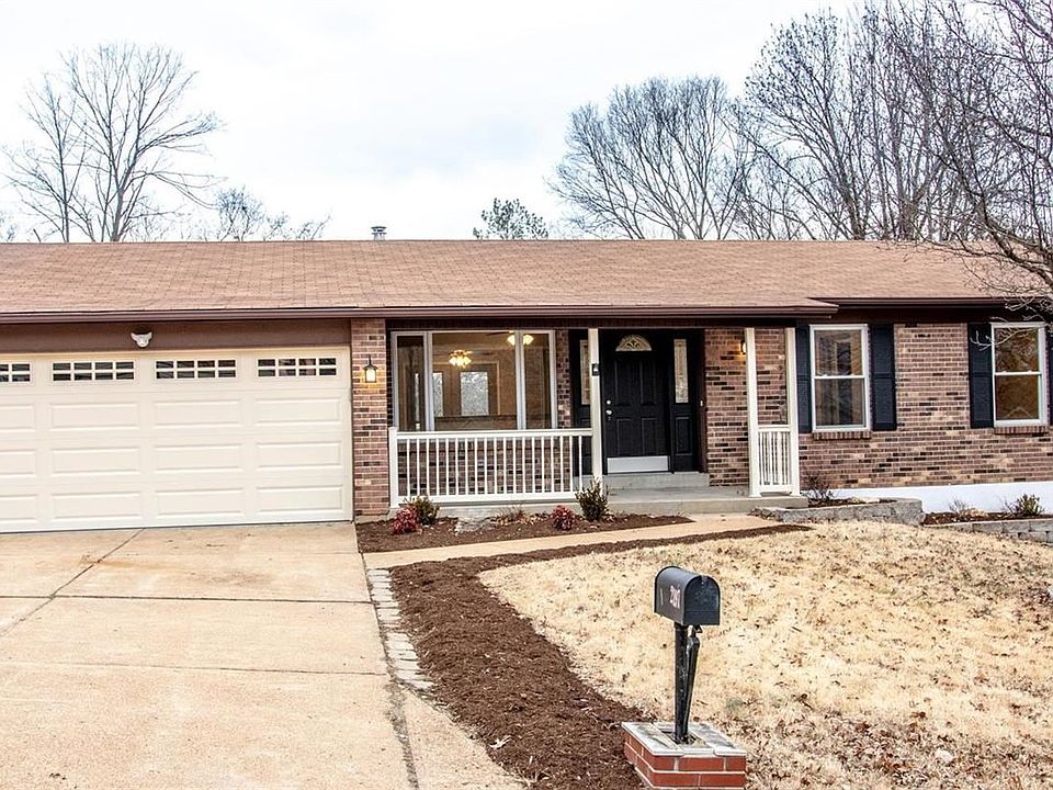 New garage door, shutters and landscaping