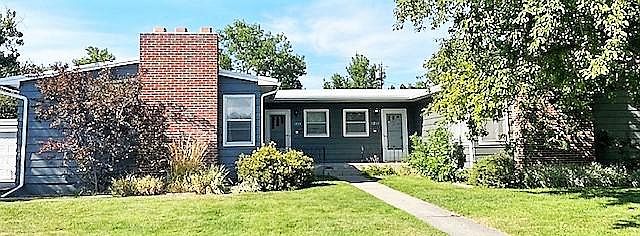 Exterior. New paint and new gutters. Lawn care provided.