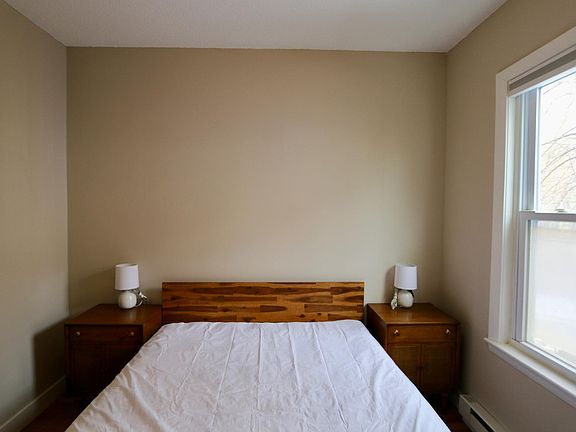 Solid wood bed, headboard, mid-century nightstands, bed side lamps