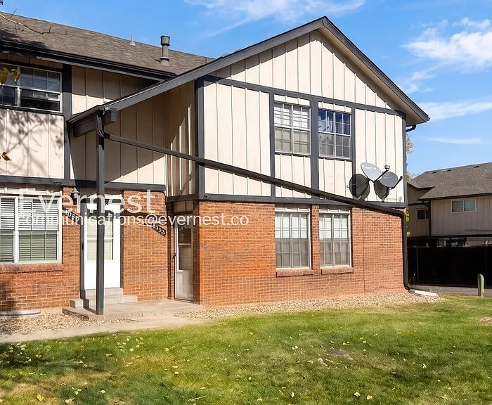 7037 S Webster St — Photo 1