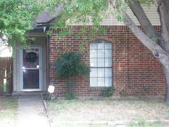 Front of home with beautiful crepe myrtle trees and shade trees