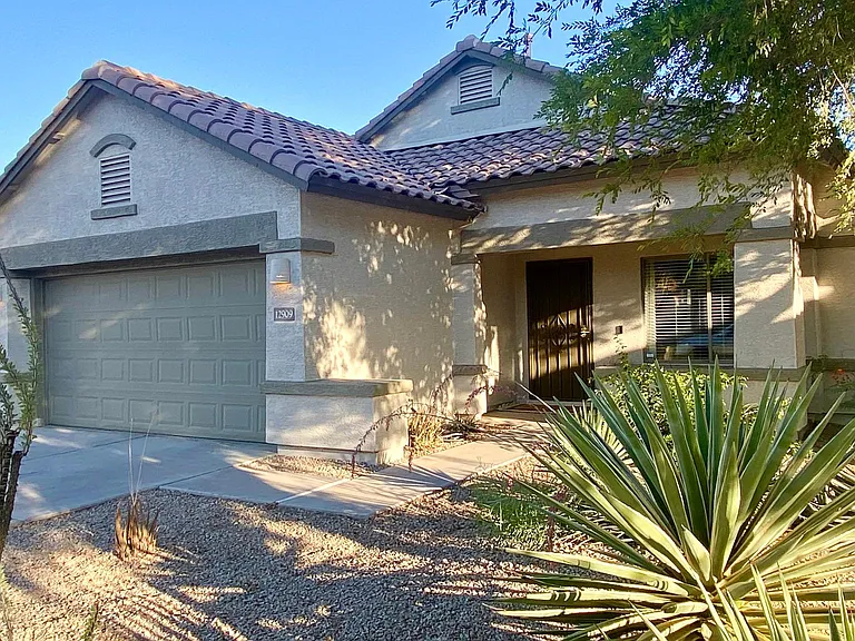 Welcome home. Two car garage and driveway parking.