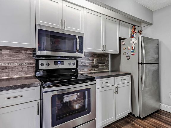 5th image of 18860 NW 57th Ave APT 306