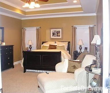 Master bed room : Double trey makes it an 11 ft. ceiling. Ceiling fan. Re-cessed can lighting.