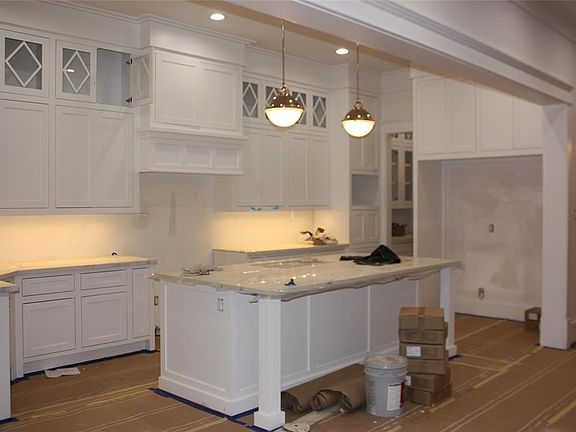 Diamond pattern cabinets continue in kitchen and butlers pantry.  The kitchen will feature a 5 foot wide full length refrigerato