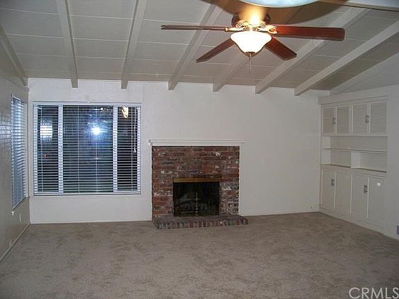 liningroom, built-in storage, ceiling fan