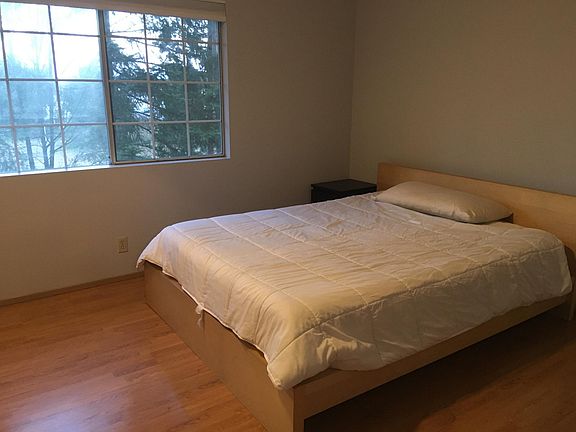 Main bedroom. Includes Queen sized IKEA bed with Beautyrest Mattress. 1 Nightstand.