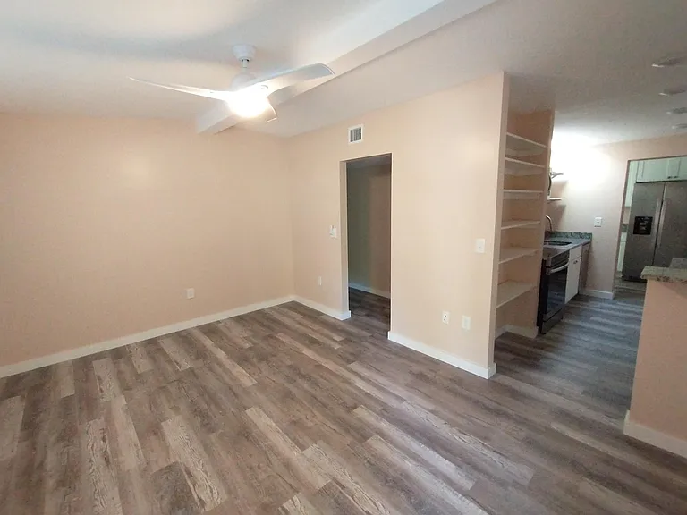 Living Room with ceiling fan and beam. All fans have remotes.