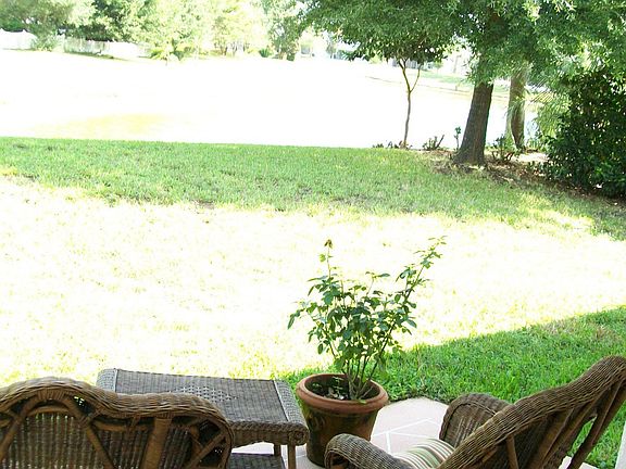 Patio view of Pond (open yard that could be "fenced")