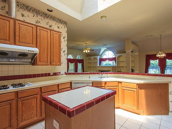 Bright and open kitchen with skylight and island
