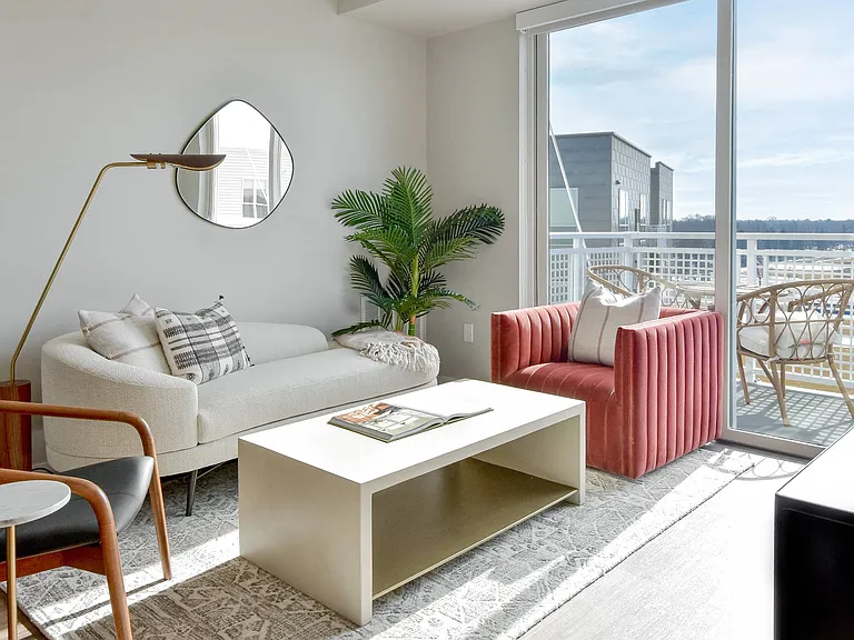 Our living room with glow of natural light at The Hallon luxury apartments in Hopkins, MN