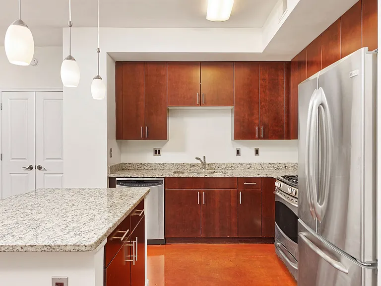 Kitchen granite countertop and stainless steel appliances