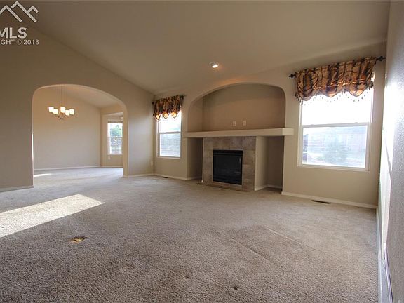 Neutral palette of colors to fit YOUR furnishings. Cozy fireplace for the winter