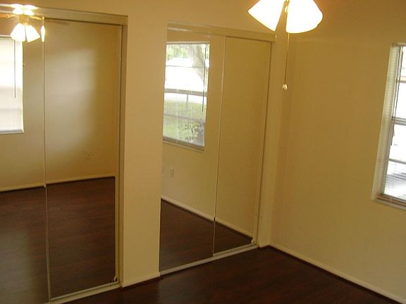 Closets have mirror doors