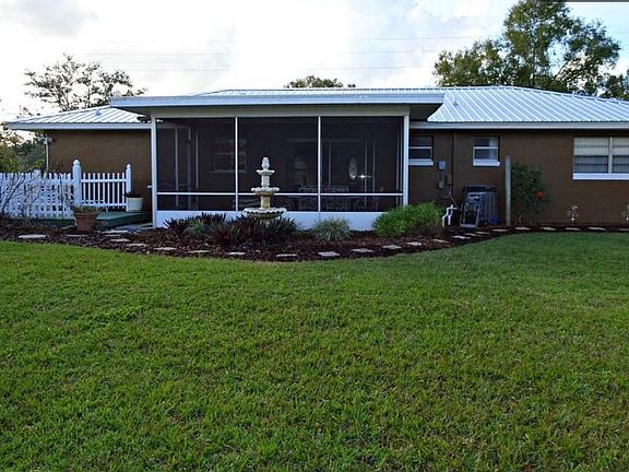 Rear with view of sundeck