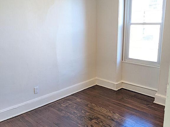 Living room with great light and fully refinished floors