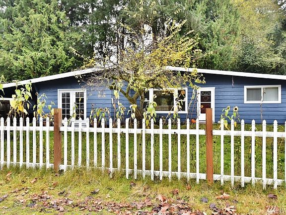 Adorable picket fence frames this charmer. 