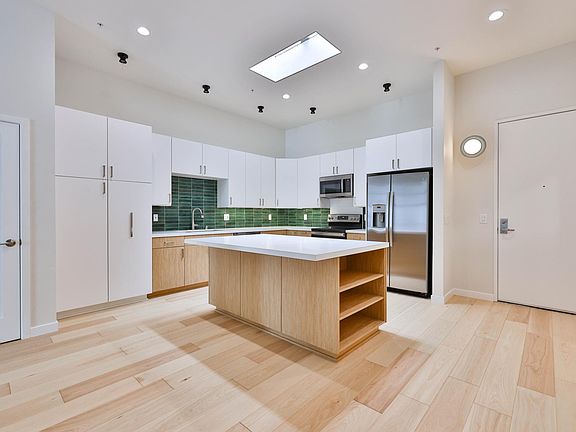 Kitchen
Door on right side of picture is front door of unit, door on left side is the washer and dryer