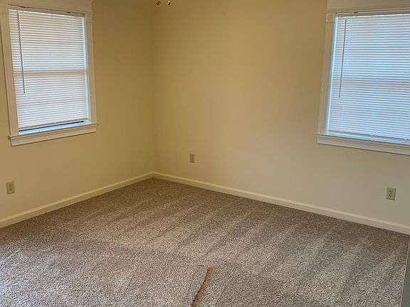 Crown molding with brand new mohawk carpet and ceiling fans throughout.