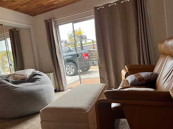 Bedroom looking from bed out side sliding glass doors