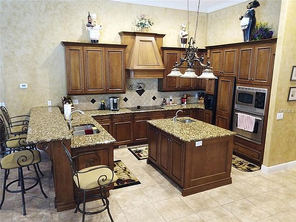 4th image of 12832 Magnolia Pointe Blvd