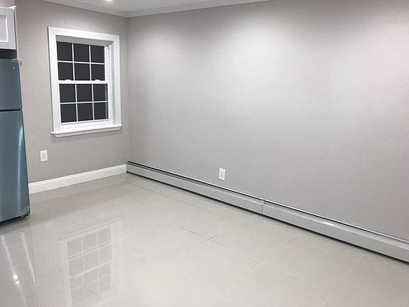 Spacious living/dining room with closet