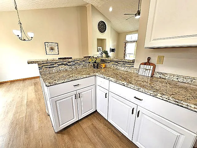 View from kitchen to spacious dining rm