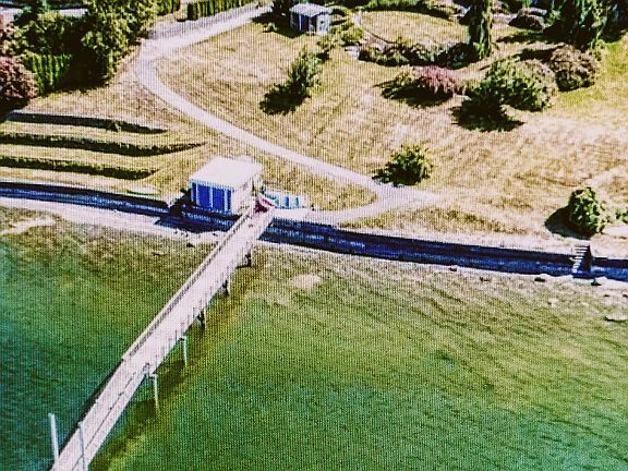 Paved and gently sloping path leads from the house to the dock, eliminating the need for steps
