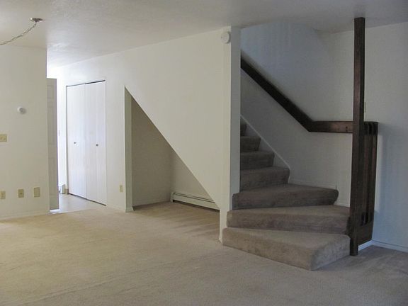 Living room and entry to upper level