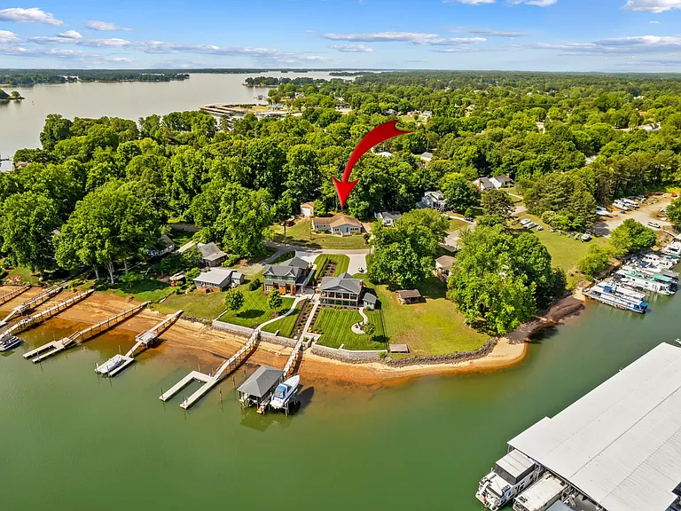 House with lake and Inland Sea Marina across the street.