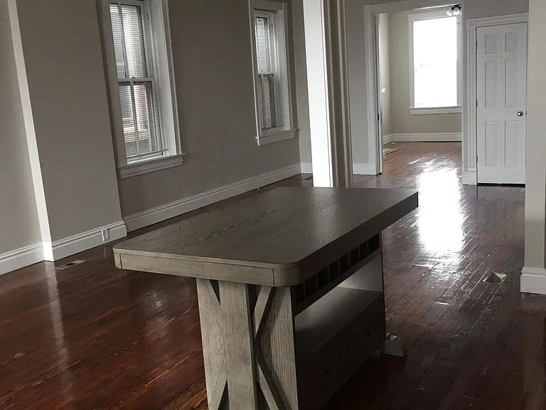 Kitchen island open living area towards bedroom