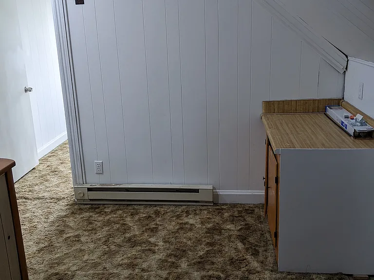 Third floor, office/playroom with a convenient half bathroom