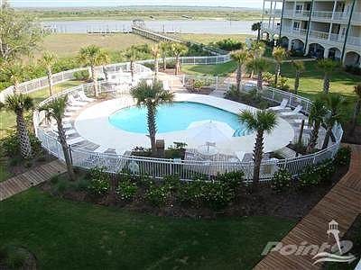 View of pool area and day docks on the ICW