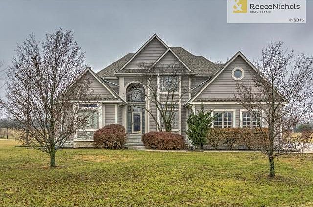 Lovely very well maintained country home on 3.4 acres.