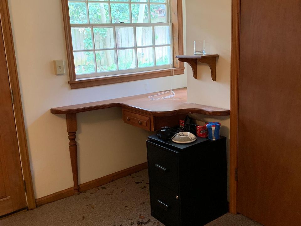 Office area with built in desk