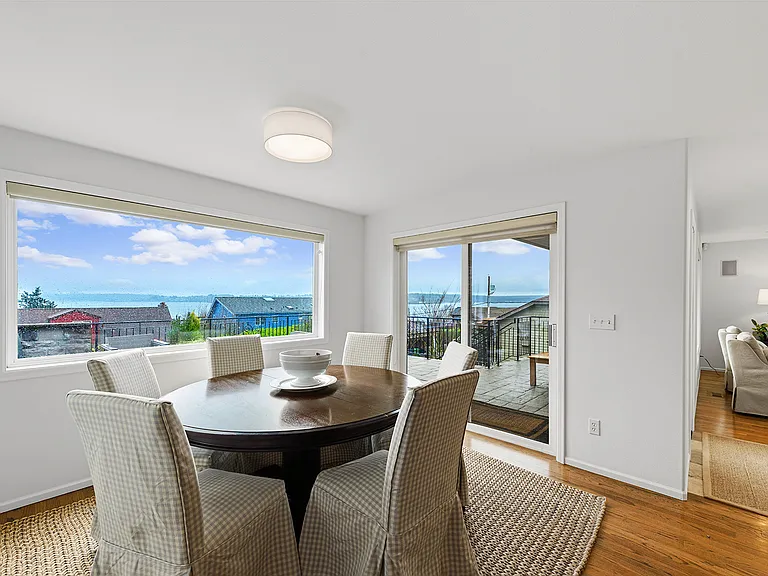 View Formal Dining Room, with glass door to huge entertaining deck with views