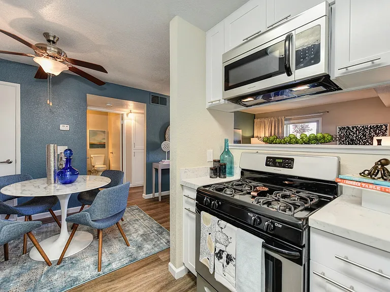 Kitchen and Dining Area with Hardwood Inspired Floors