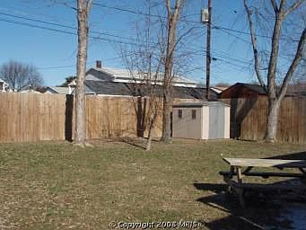 large, fenced back yard