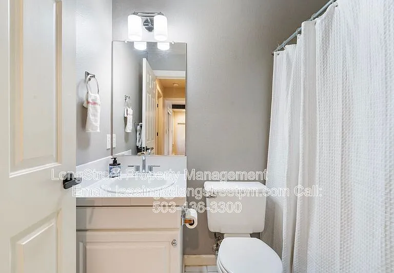 10247 NW Village Heights Dr — Photo 27