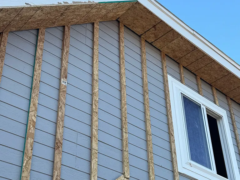 REMODEL. Home has masonry block construction. Sturdy but a total heat sink. Hence all the frame out and foaming of the exterior walls. Like one big insulated beer cooler afterwards LOL