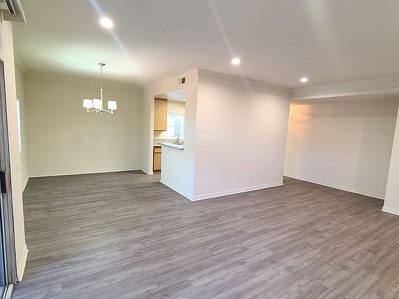 NEW wide plank laminate wood-style flooring throughout ENTIRE unit. Easy cleaning and a unified, modern look.
