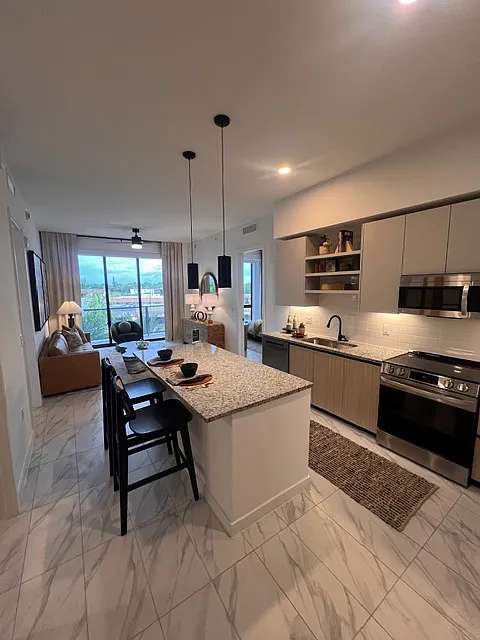 16069 W Dixie Hwy #202