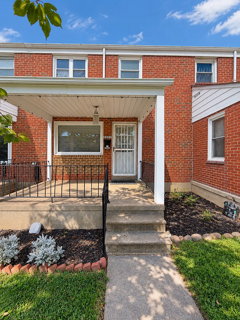 Charming 3-Bedroom Home with Hardwood Floors & Covered Parking — Photo 1