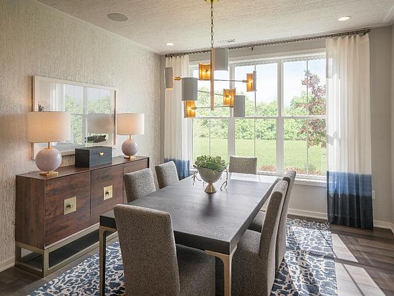 Foyer opens to beautiful formal dining room