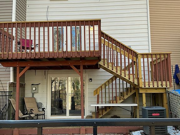 All 3 floors and 2 backyard decks overlooking Mine Creek and Raleigh Greenway. Fenced in yard and stone pavers located on a shaded and level back yard.